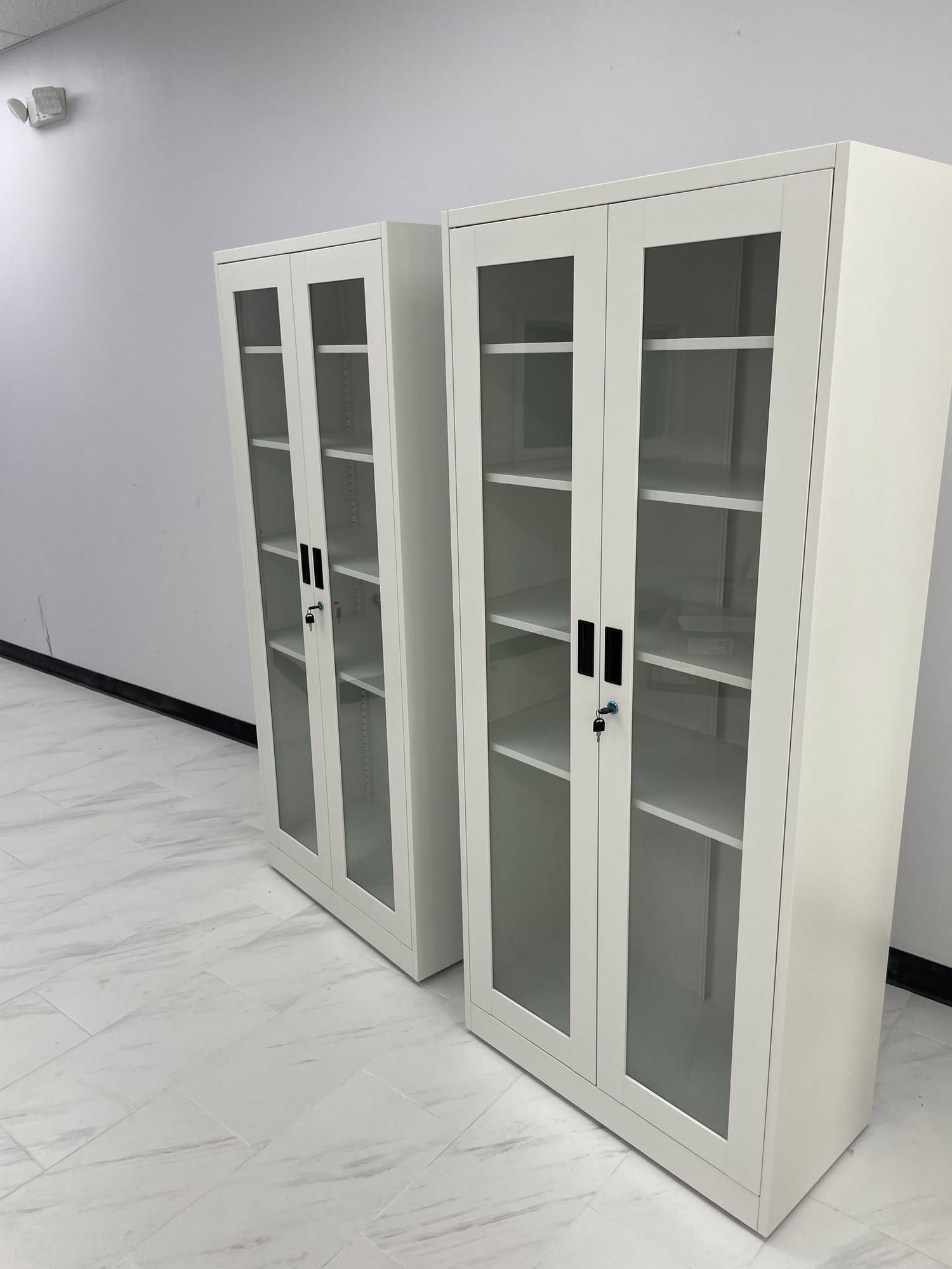 Pair of assembled glass-door storage cabinets